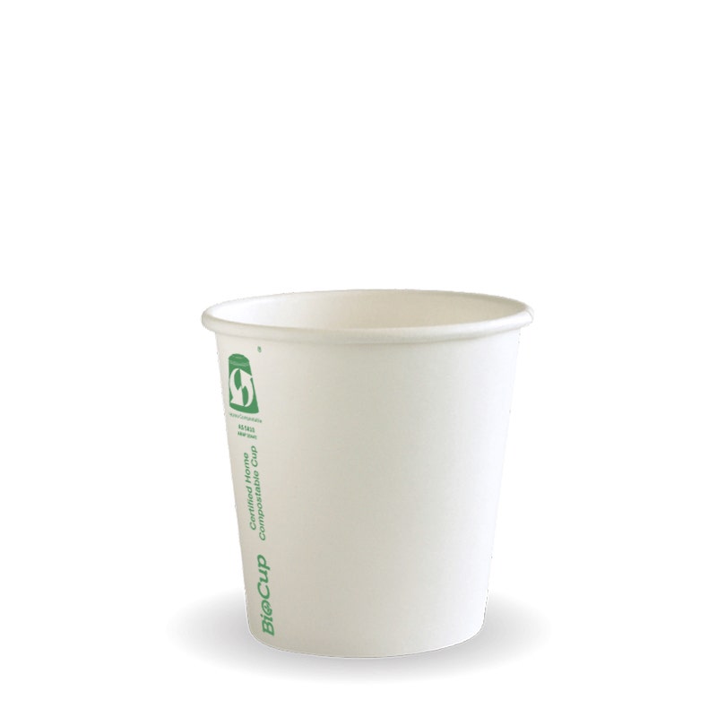 A plain white 120ml BioCup with a green eco-friendly label printed on the side, SA Compliant and designed as a White Single Wall BioCup, stands upright on a white background.