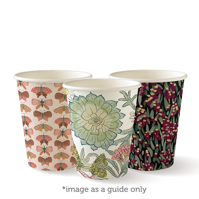 Three paper cups, including a White PHA BioCup, with different botanical and floral patterns are displayed side by side against a plain background. Text below reads, "*image as a guide only.