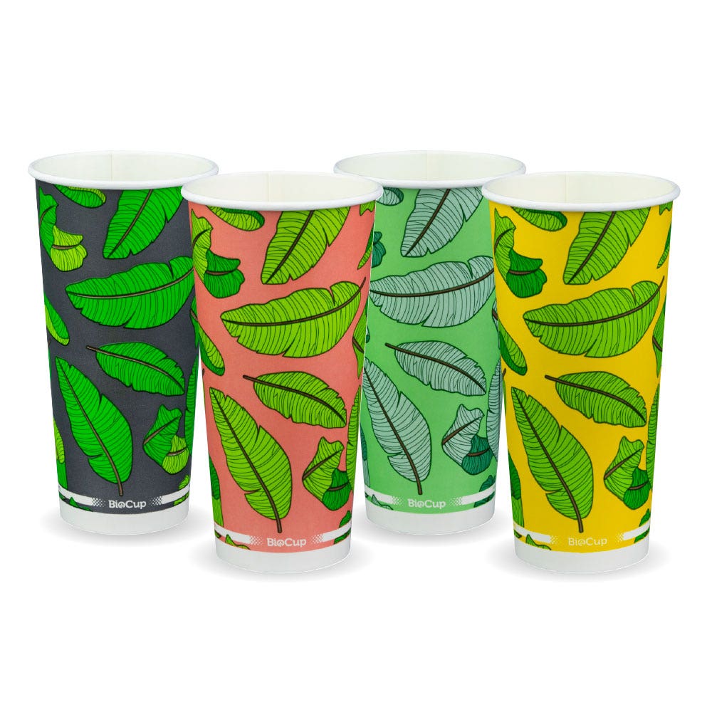 Four tall 650ml bio cups with green leaf patterns on different colored backgrounds—black, pink, green, and yellow—perfect as cold paper cups for any occasion.